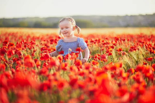 Adorable Toddler Girl Blue Dress Walking Field Blooming Poppies Happy — Stock Photo, Image