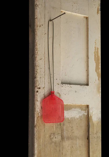 Red Fly Swatter Nail — Stock Photo, Image