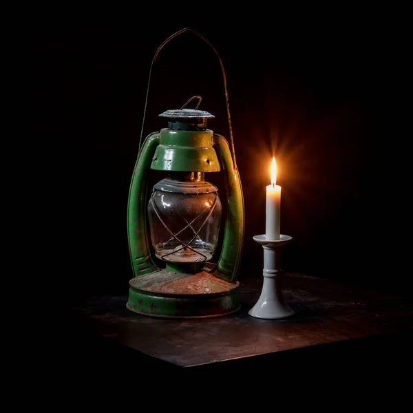 kerosene oil lamp and candle.
