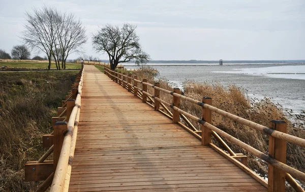 Wooden path over a lake. — Stock Photo, Image