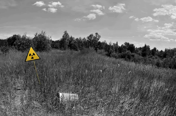 Sign of radioactive contamination, near Pripyat.It is an abandoned city in northern Ukraine, near the border with Belarus.Pripyat was founded on in 1970, the ninth nuclear city in Soviet Union, for the Chernobyl Nuclear Power Plant.