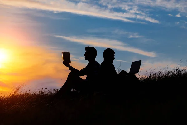 Silhouette Men Laptop Book Sunset Sunrise Background Idea Contradictions Old — Stock Photo, Image