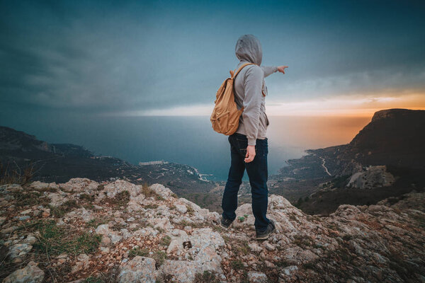 Winner silhouette on the mountain top. Sport and active life concept