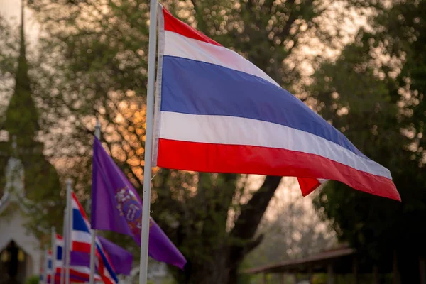 The blowing Thai flag at the sunset. — Stock Photo, Image