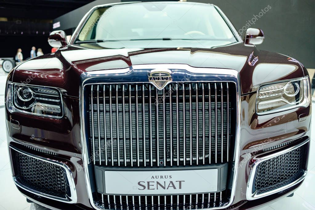 MOSCOW, SEPTEMBER 31, 2018: The newest Aurus Senat car on automotive exhibition stand on MMAC 2018. Automobile show of family personal cars. World last automotive developments and achivements.