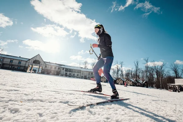 Cross-country skiing woman doing classic nordic cross country sk