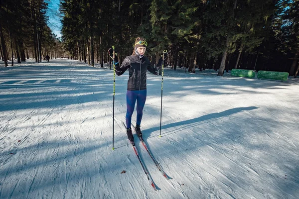 Cross-country skiing woman doing classic nordic cross country sk