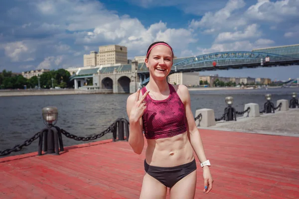 professional young female runner player running in park