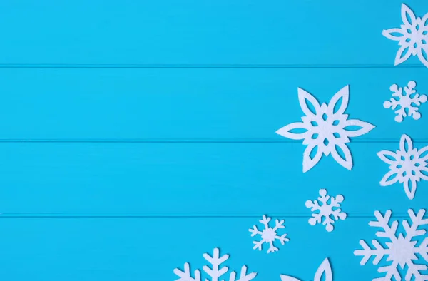 Сніжинки Зірки Синьому Дерев Яному Фоні — стокове фото