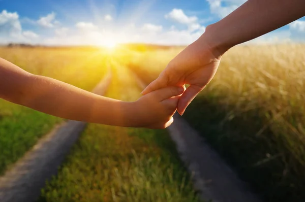 Hands Holding Each Other Field Road Sun — Stock Photo, Image