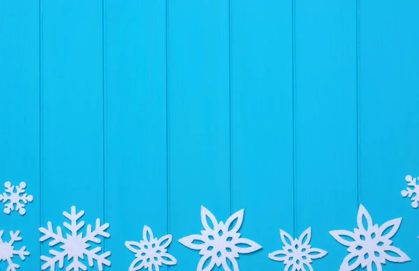 Copos Nieve Estrellas Sobre Fondo Madera Azul —  Fotos de Stock