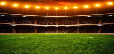 Parlak ışıkları olan futbol stadyumu.