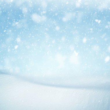Winter background, falling snow over winter landscape with copy space clipart