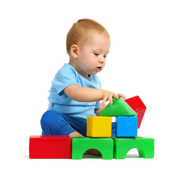 Little boy playing toy isolated on white background