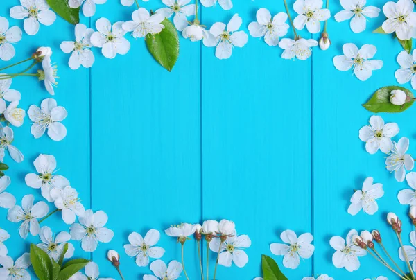 Spring flowers on wood — Stock Photo, Image