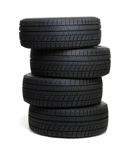 Neumáticos de coche en blanco —  Fotos de Stock
