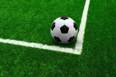 Futbol sahasında futbol topu