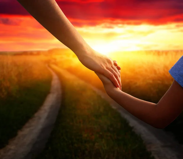 Hands Holding Each Other Field Road Sun — Stock Photo, Image