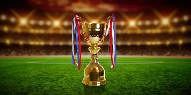 Futbol stadyumunda arka planda altın kupa