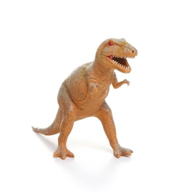 Beyaz arka planda izole edilmiş plastik dinozor oyuncağı