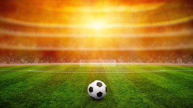 Stadyumdaki futbol topu aydınlatma, yeşil çimenler ve gece gökyüzü