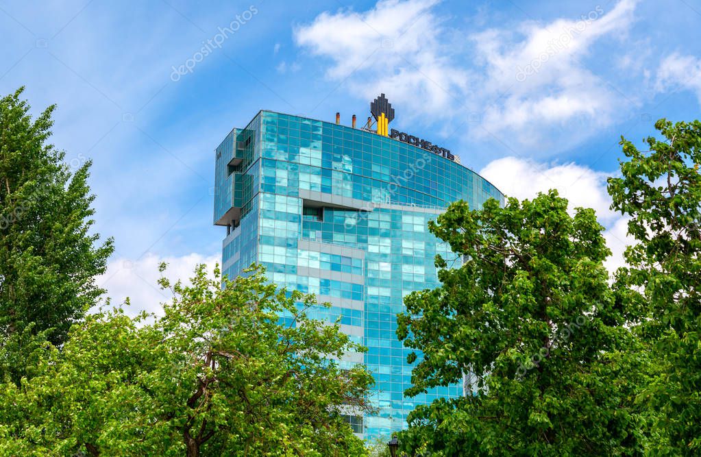 Samara, Russia - June 2, 2018: Emblem of the oil company Rosneft on the office building. Rosneft is one of the largest russian oil companies