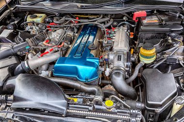 Samara, Russia - May 19, 2018: Tuned turbo car engine of Toyota in vehicle, under the hood of a vehicle clipart