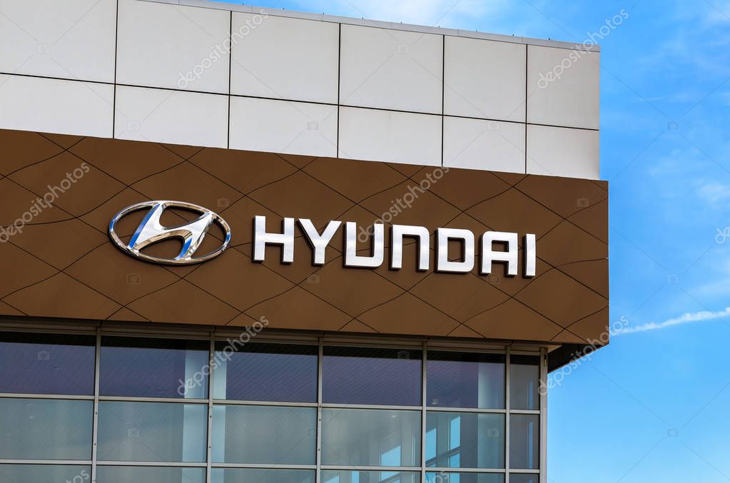 Samara, Russia - May 19, 2018: Hyundai dealership logo on the facade of official dealer. Hyundai Motor Company is a South Korean multinational automotive manufacturer