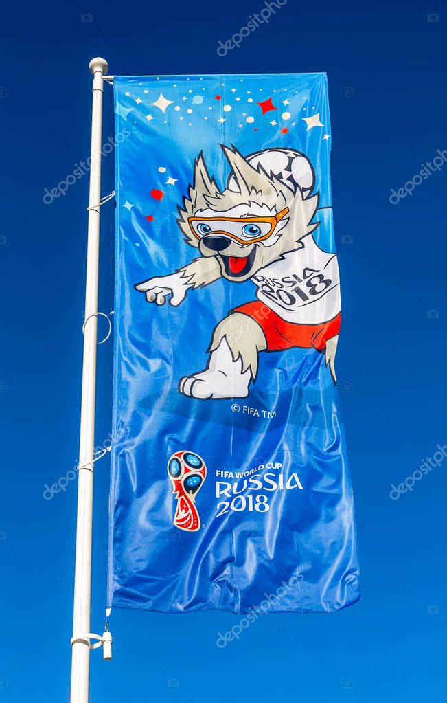 Samara, Russia - June 17, 2018: Flag with official mascot of 2018 FIFA World Cup Zabivaka against the blue sky