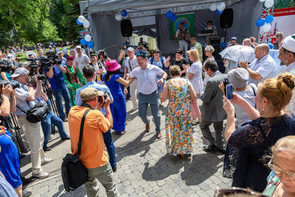 Samara, Russia - June 30, 2018: Governor of the Samara region Dmitry Azarov (in centre) at the traditional Tatar festival Sabantuy