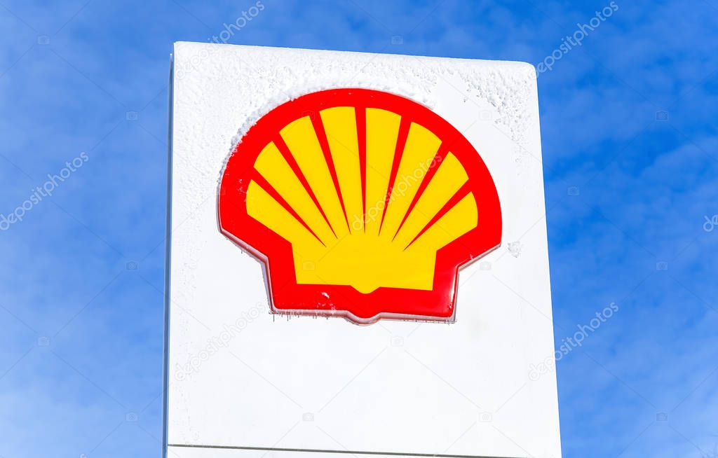 Samara, Russia - January 8, 2018: Emblem of the Royal Dutch Shell oil company against the blue sky