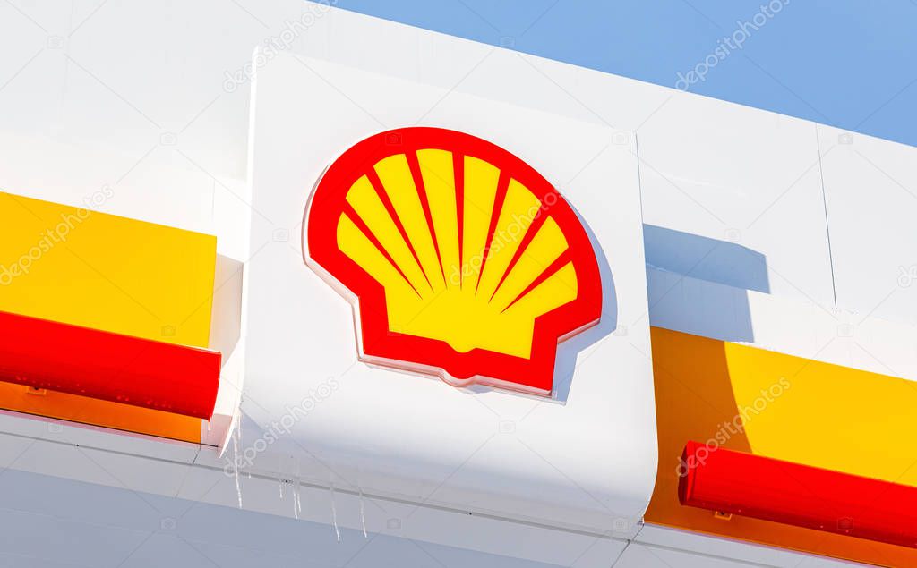 Samara, Russia - January 8, 2018: Emblem of the Royal Dutch Shell oil company against the blue sky