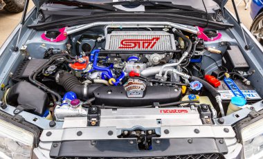 Samara, Russia - May 19, 2018: Tuned turbo car engine of Subaru vehicle, under the hood of a vehicle clipart