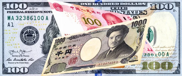 Japanska yen sedel, amerikanska dollar och kinesiska yuan — Stockfoto