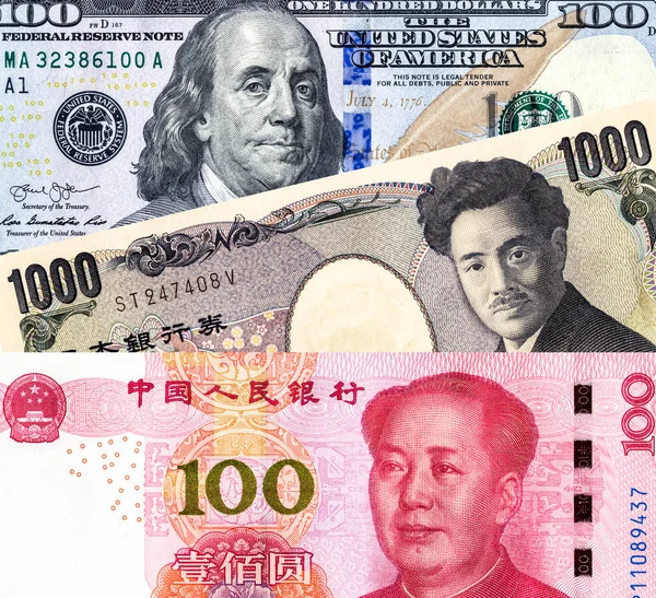 Japán yen bankjegy, az amerikai dollár és a jüan — Stock Fotó