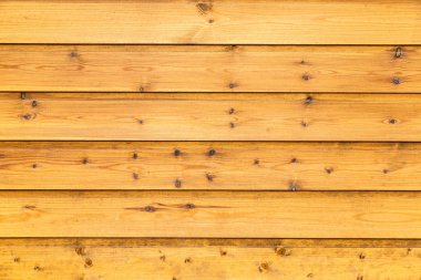 Arka planda doğal desenleri olan tahta tahtalar.