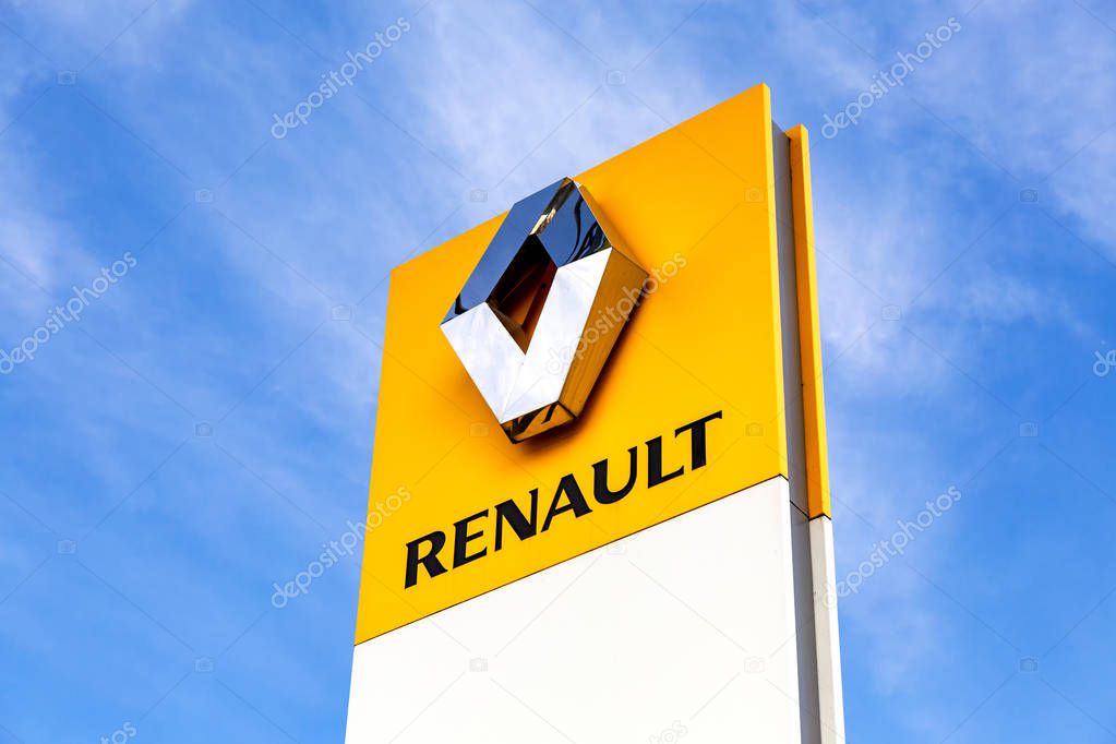Veliky Novgorod, Russia - August 23, 2019: Renault dealership sign against the blue sky. Renault is a French multinational vehicle manufacturer