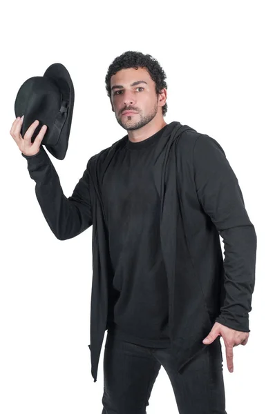 Чоловік в чорному зі своїм чорним капелюхом — стокове фото