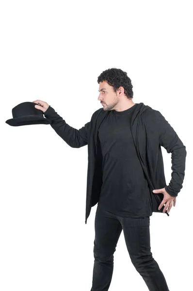 Homem de preto com seu chapéu preto — Fotografia de Stock