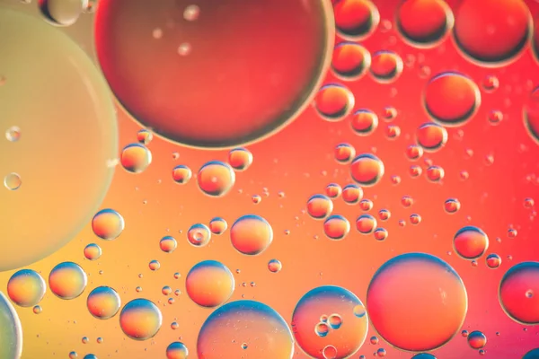Cuadro de fondo abstracto rojo y naranja hecho con aceite, agua y jabón — Foto de Stock