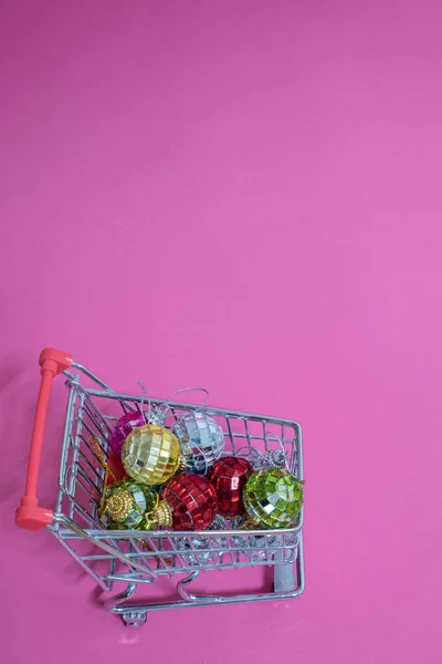 Christmas toys in shopping trolley — Stock Photo, Image