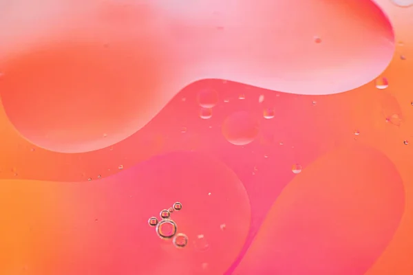 Czerwony i pomarańczowy abstrakcyjny obraz tła wykonany z oleju, wody i mydła — Zdjęcie stockowe