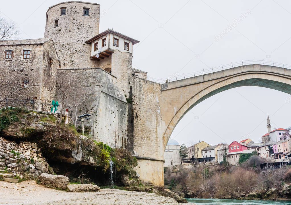 Beautiful view on Mostar city with old bridge and ancient buildi