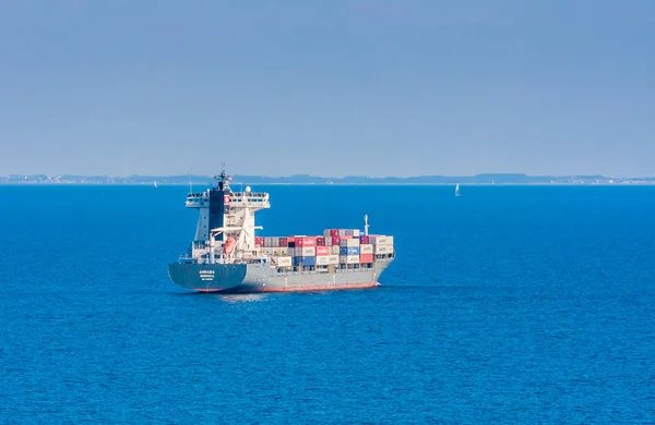 Copenhagen, Denmark. Cargo ships float in blue sea. Marine trans — Stock Photo, Image