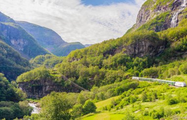 View from the Flam Railway (Fl��msbana), a scenic railway which  clipart