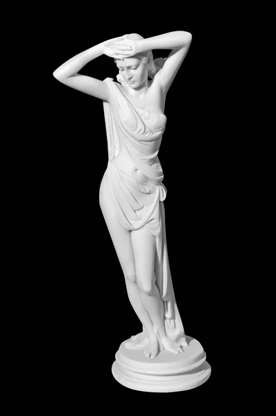 Statue einer nackten Frau auf schwarzem Hintergrund — Stockfoto