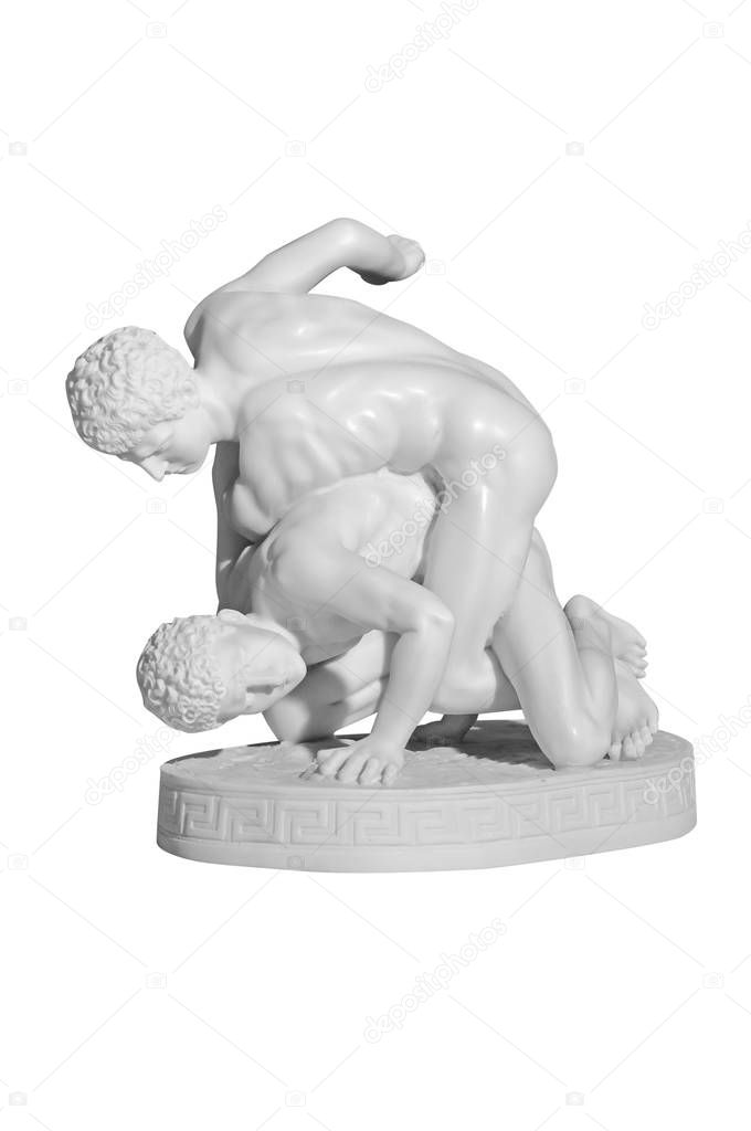figurine of wrestlers on a white background