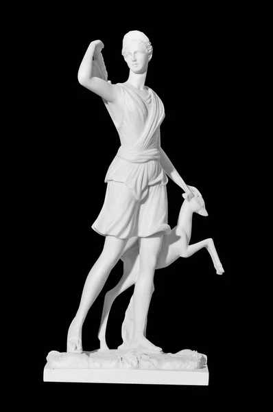 Statue av en kvinne på svart bakgrunn – stockfoto