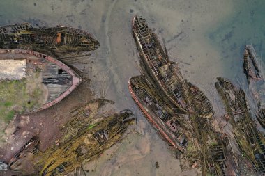 Ship graveyard in Teriberka, Kola Peninsula, Russia. Aerial view clipart