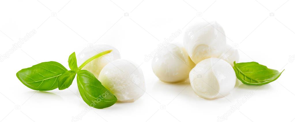 mozzarella cheese balls and basil leaves isolated on white background